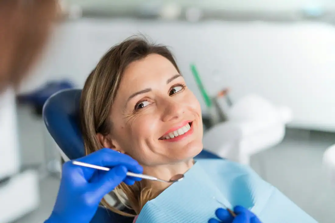 woman with ceramic dental crowns