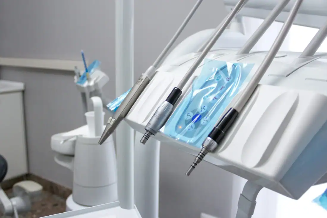A dental room with toothbrushes and dental equipment