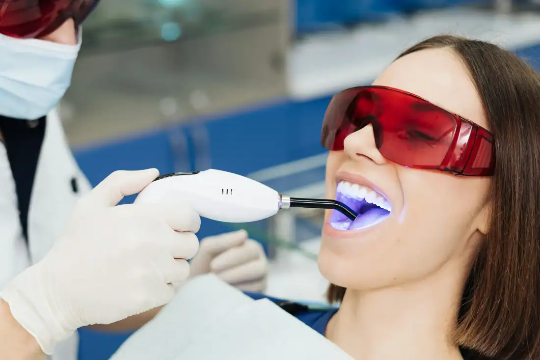dentist using laser dentistry equipment