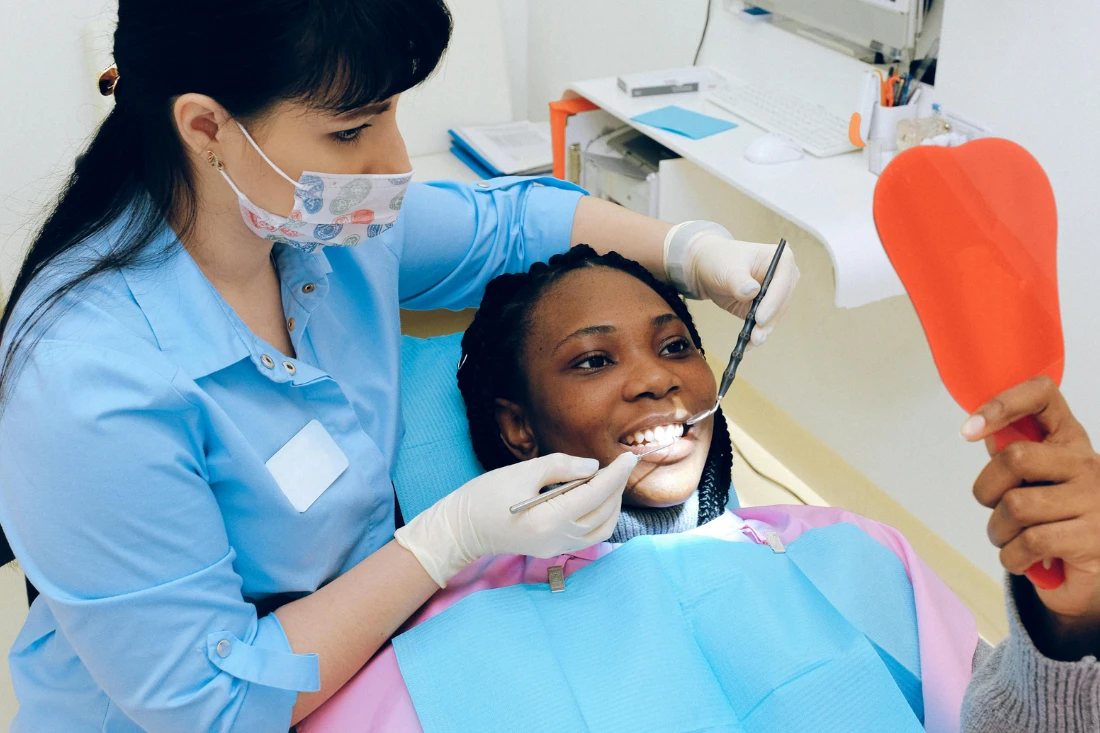 dentist and patient during a dentist appointment