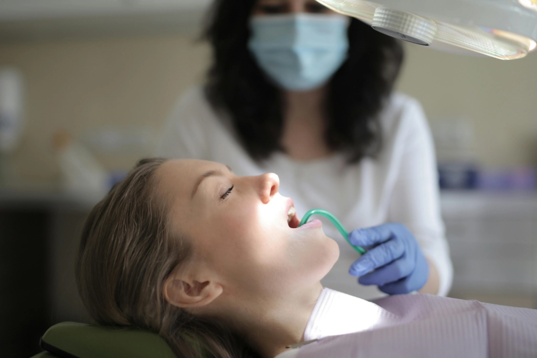 Dentist and patient during appointment