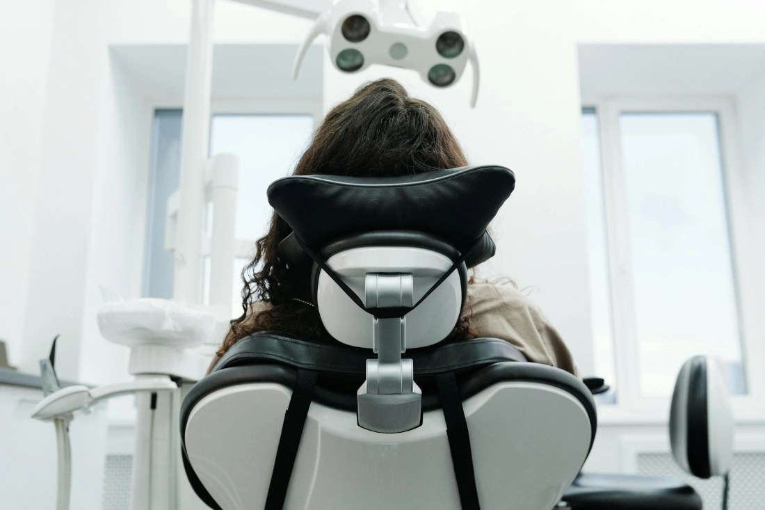 A patient in a dentist's chair.
