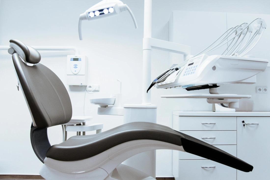 A dental chair in a dental office.