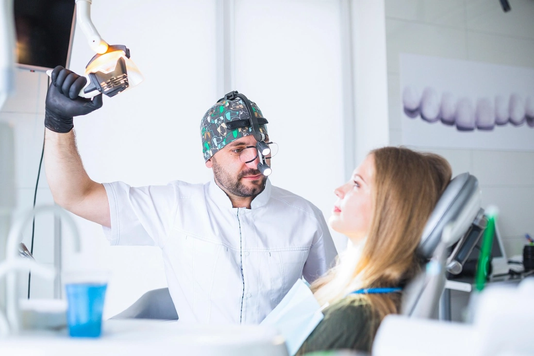 A dentist and a patient during a regualr dental check up at Dental Innovations