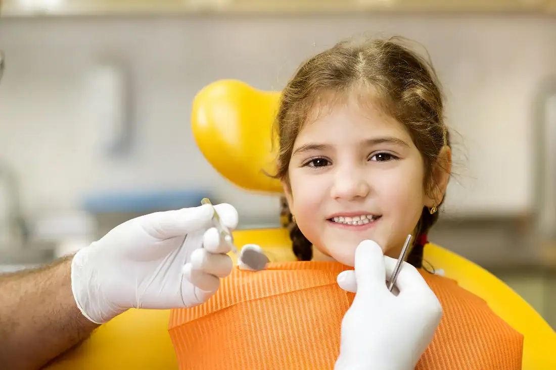 Little girl at a pediatric dentist.