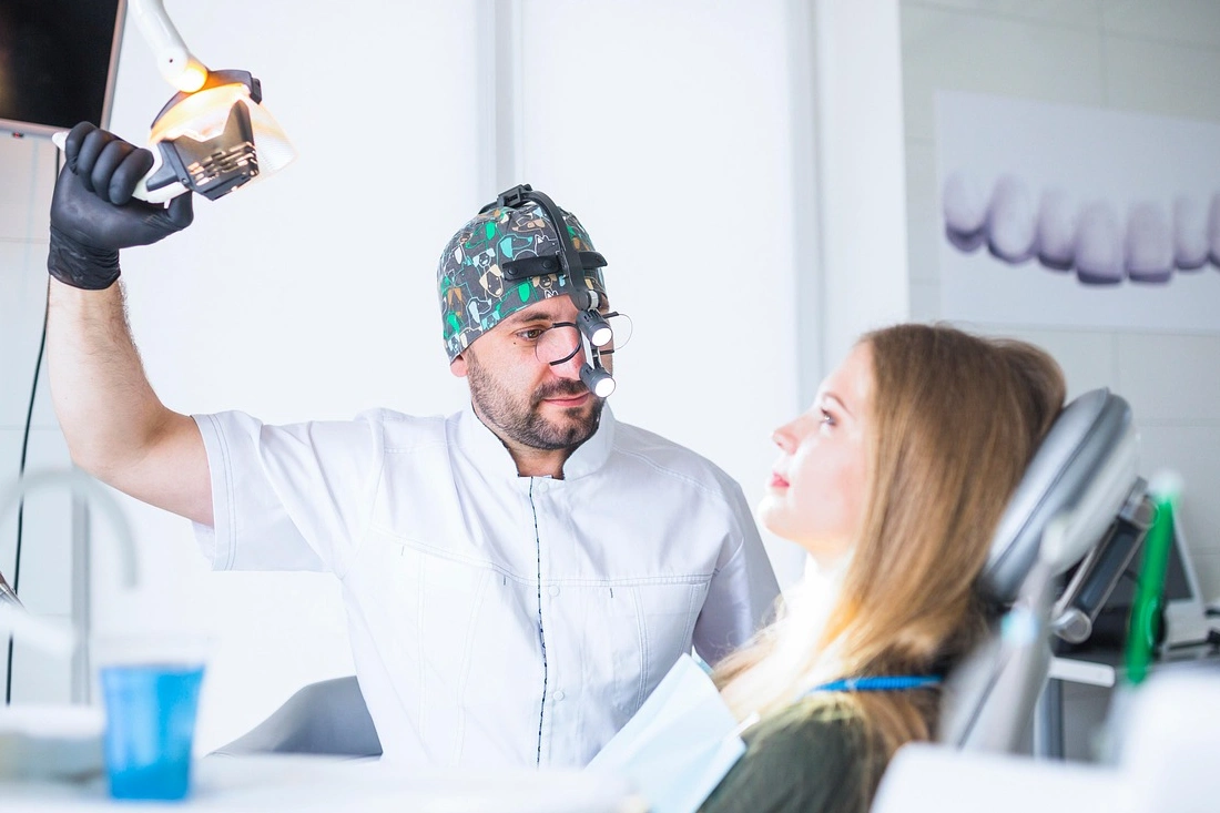 a woman consulting dental professional